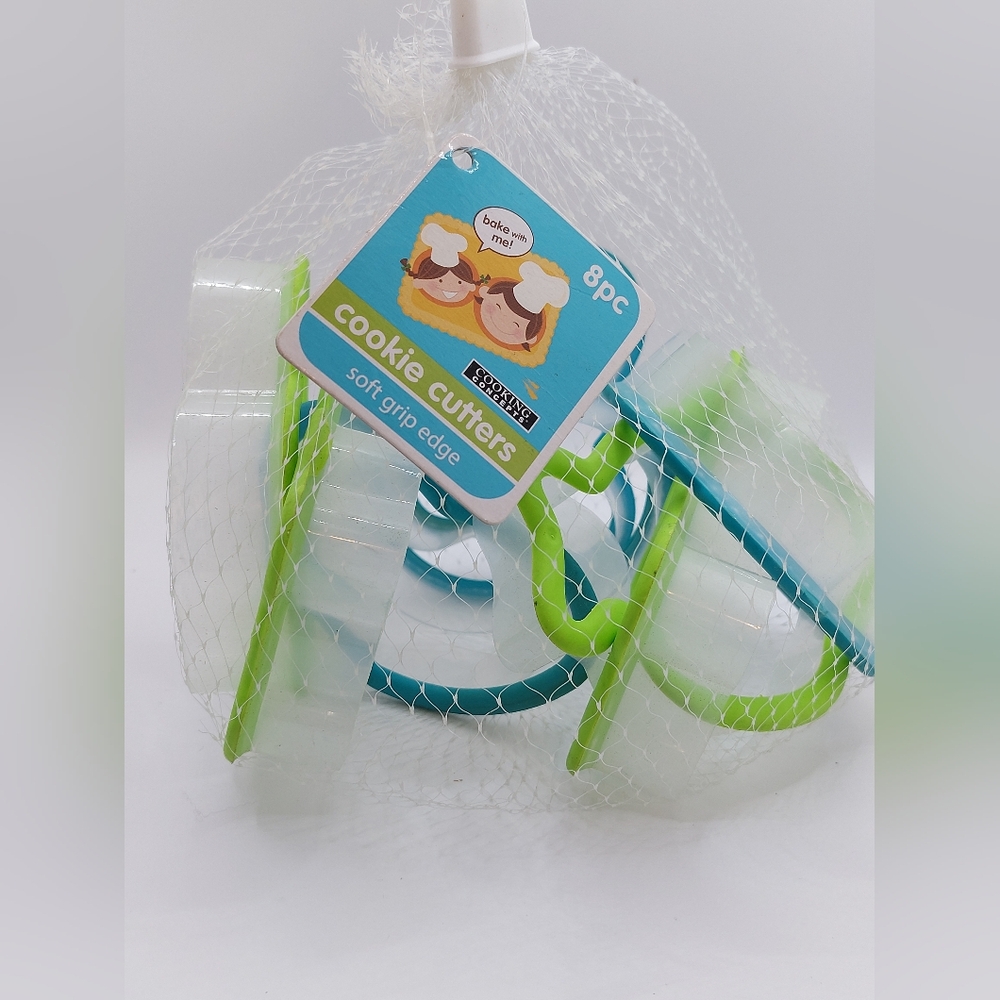 New with tags, 8 piece Soft edge grip cookie cutters by Cooking Concepts